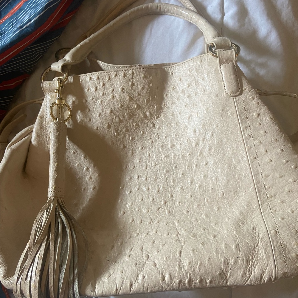 G.I.L.I. Roma Cream ostrich leather tote bag.